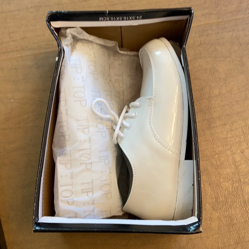 Boys first communion shoes and armband.